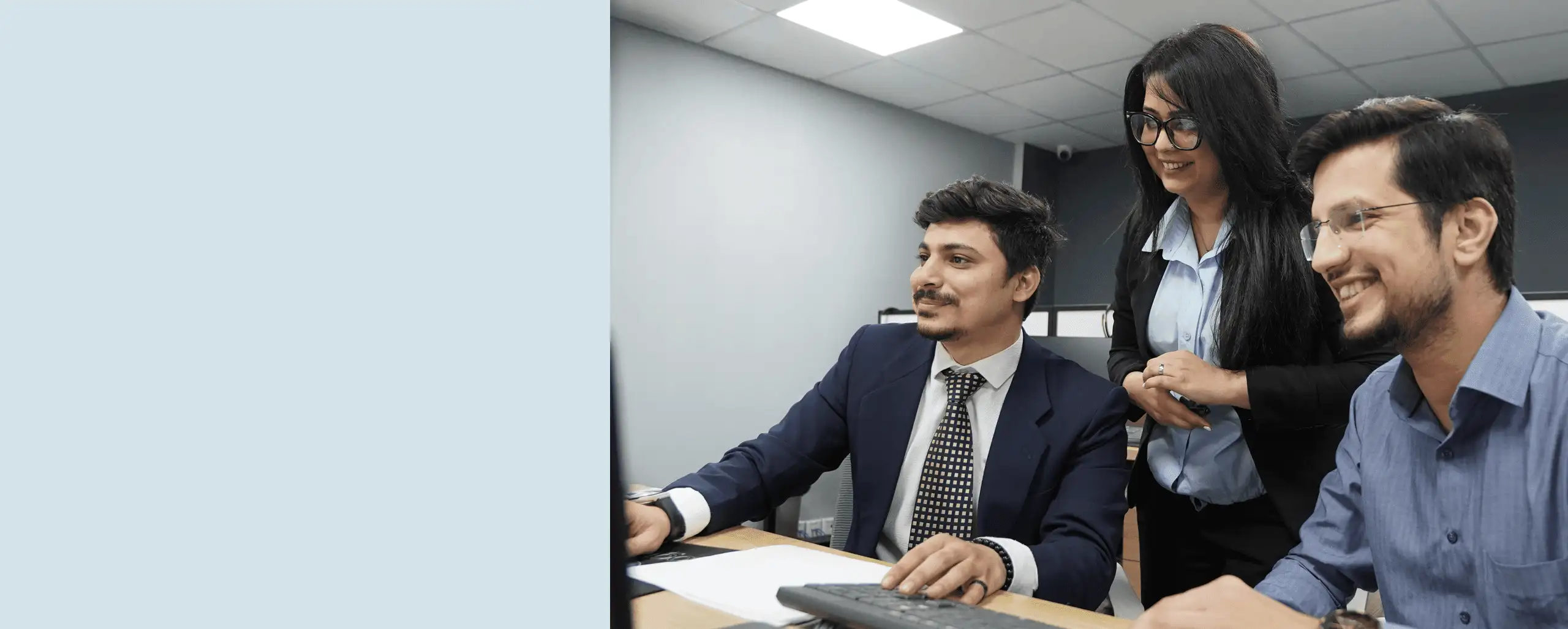DCC Consultants colleagues collaborating in their Lahore office